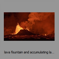 lava fountain and accumulating lava at night